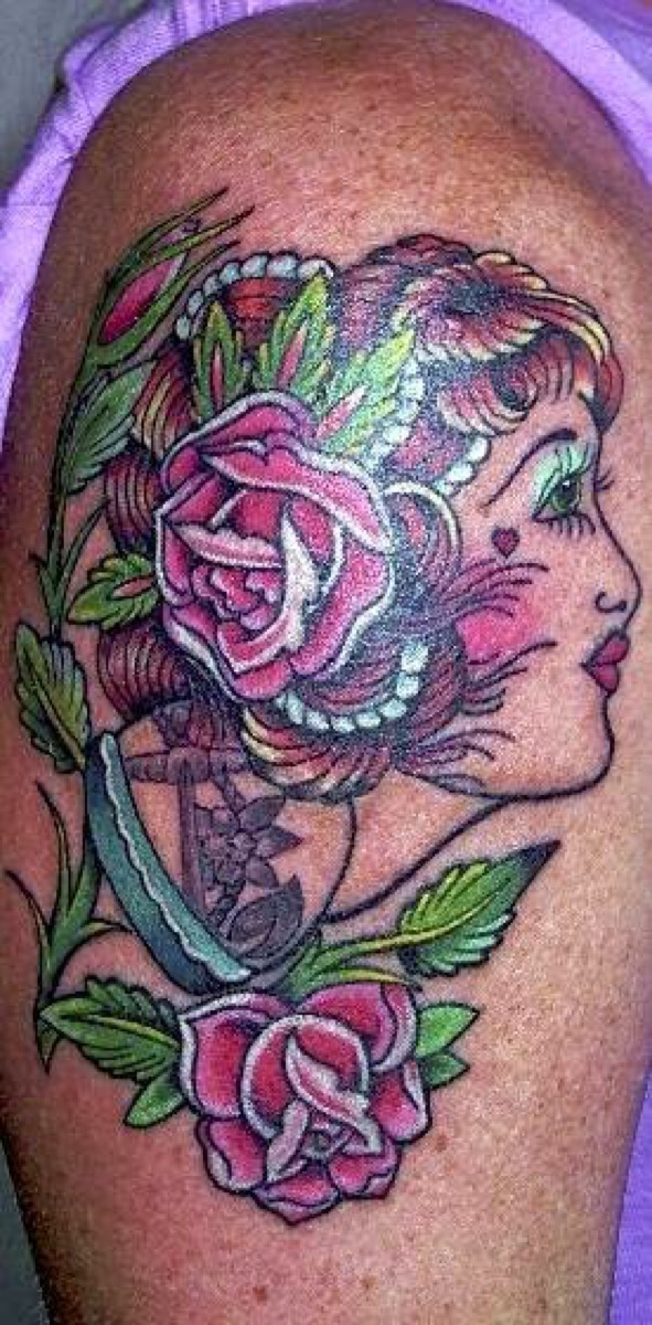 Detailed color portrait tattoo with roses, custom work at Absolution Ink Tattoo in Scottdale, GA